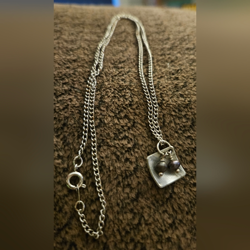 Elegant Silver Necklace with Pearl Accents